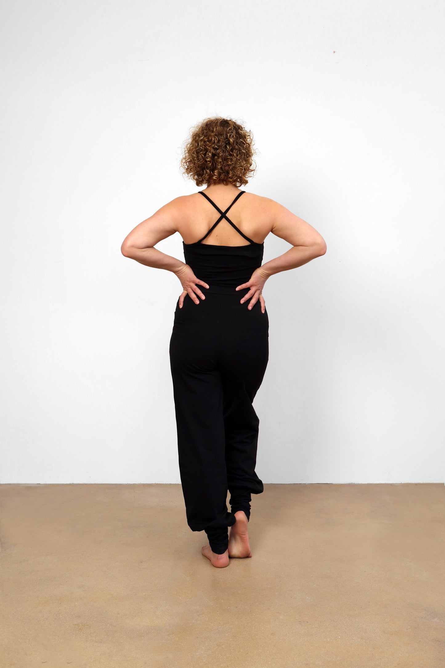 yoga jumpsuit nashira color black breath of fire back view