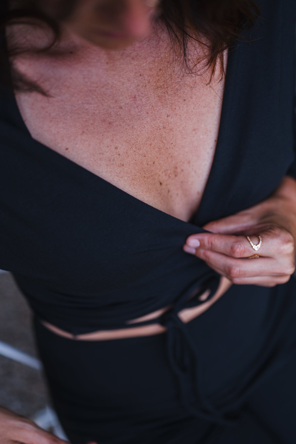 Breath of Fire Talya wrap shirt — Black — lifestyle photo, movement in mercerized organic cotton