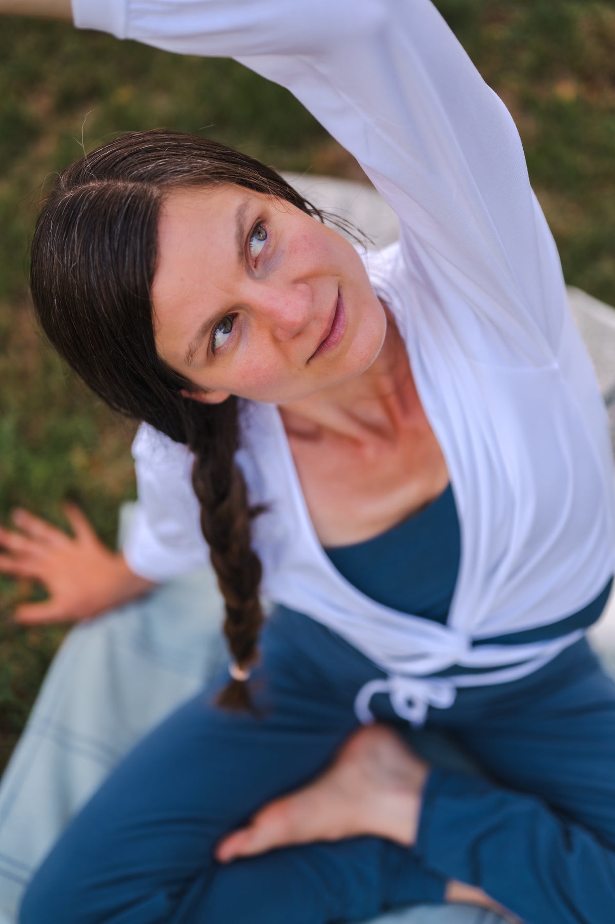 Breath of Fire Talya wrap shirt — White — lifestyle photo, organic cotton wrap worn during practice