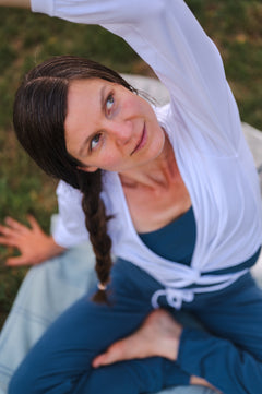 Breath of Fire Talya wrap shirt — White — lifestyle photo, organic cotton wrap worn during practice